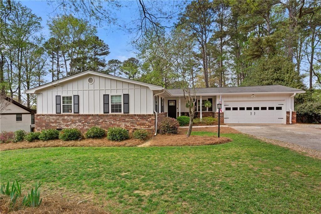 front view of a house with a yard