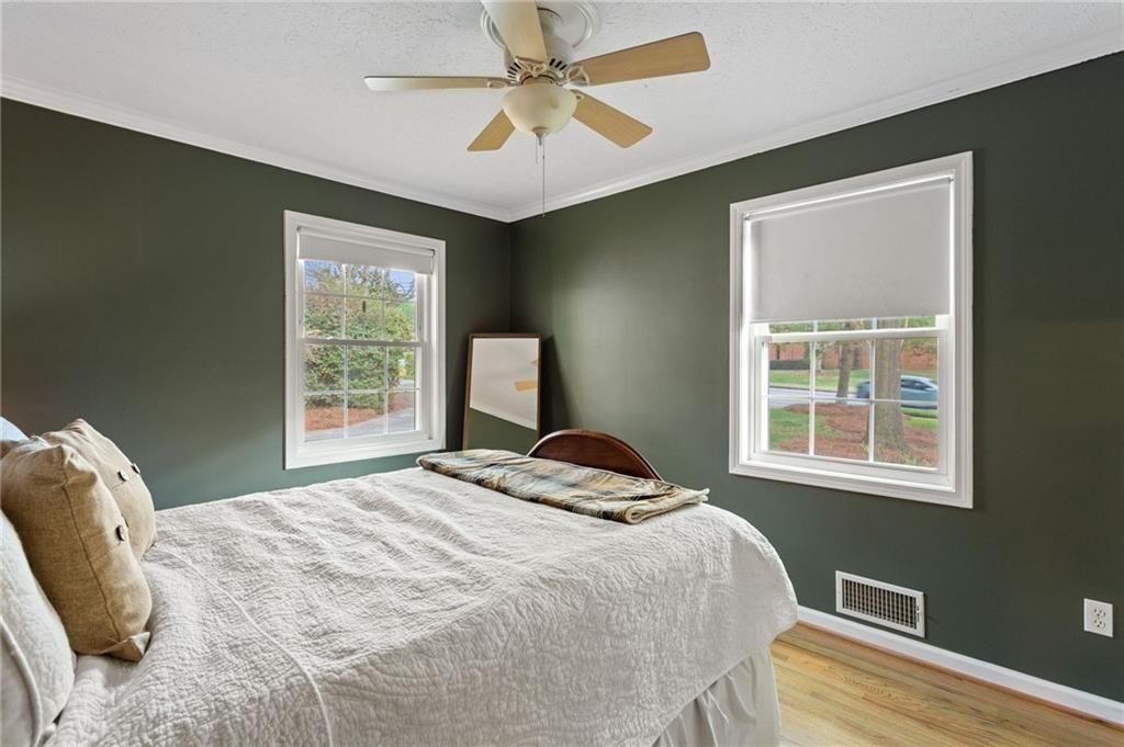 2624 Peeler Road Atlanta, GA 30360 - Photo 25 of 46 a bedroom with a bed and a window