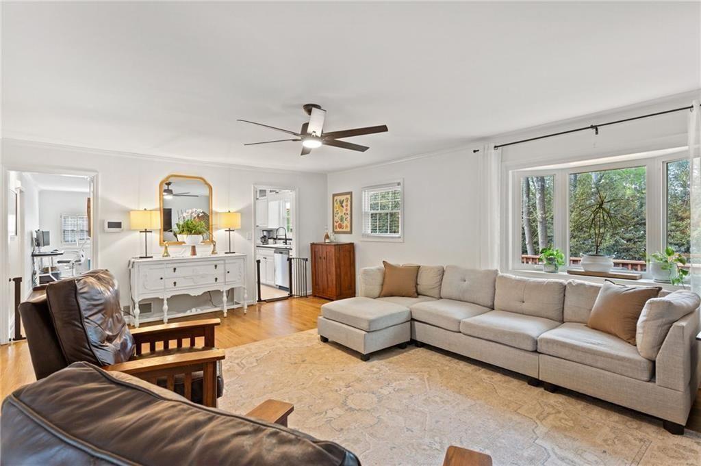 2624 Peeler Road Atlanta, GA 30360 - Photo 9 of 46 a living room with furniture and a large window