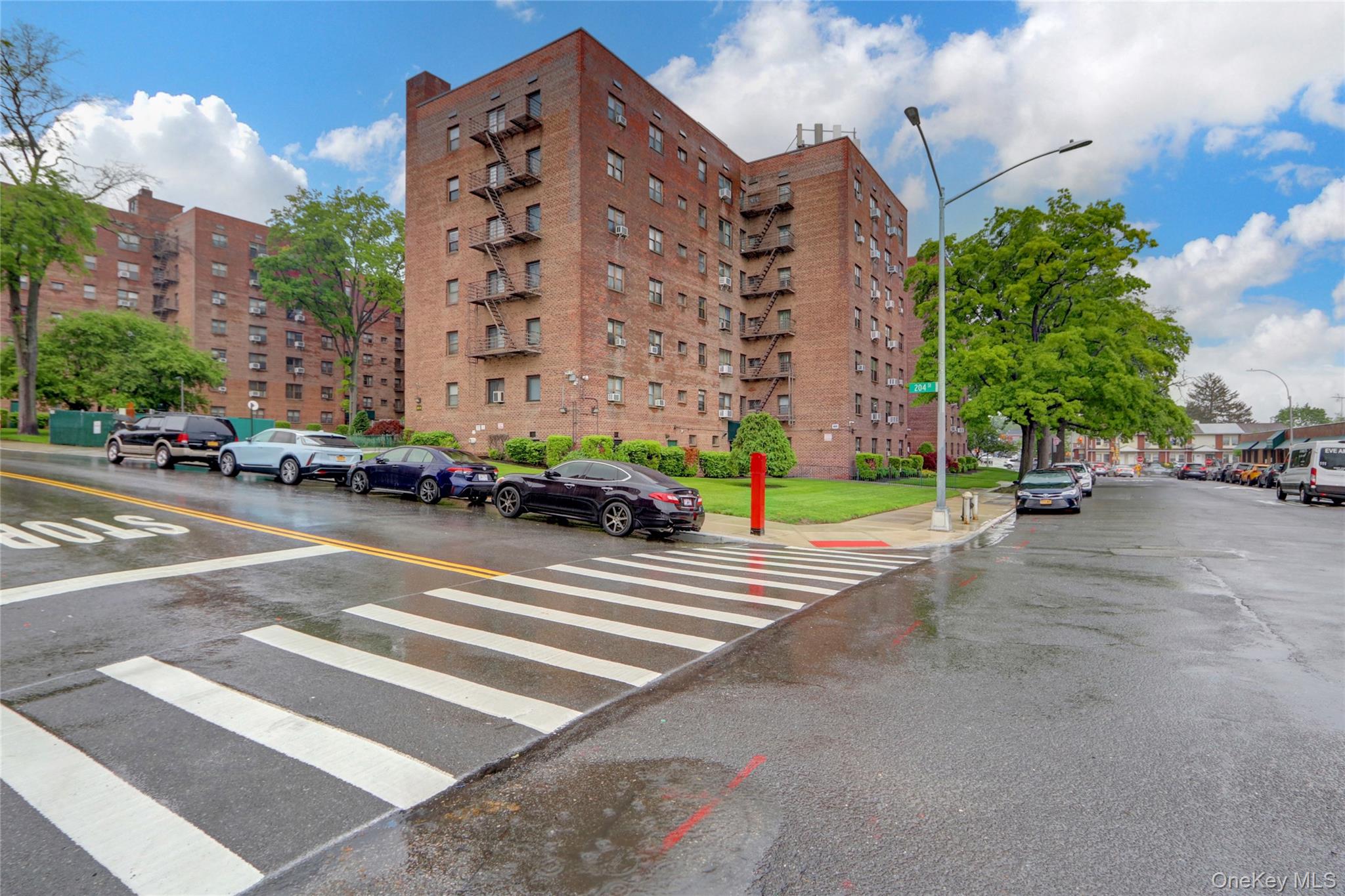 204-15 Foothill Avenue, Unit B53 Queens, NY 11427 - Photo 3 of 18 a view of a building with a street