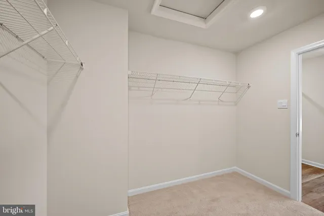 a view of a room with racks on the wall