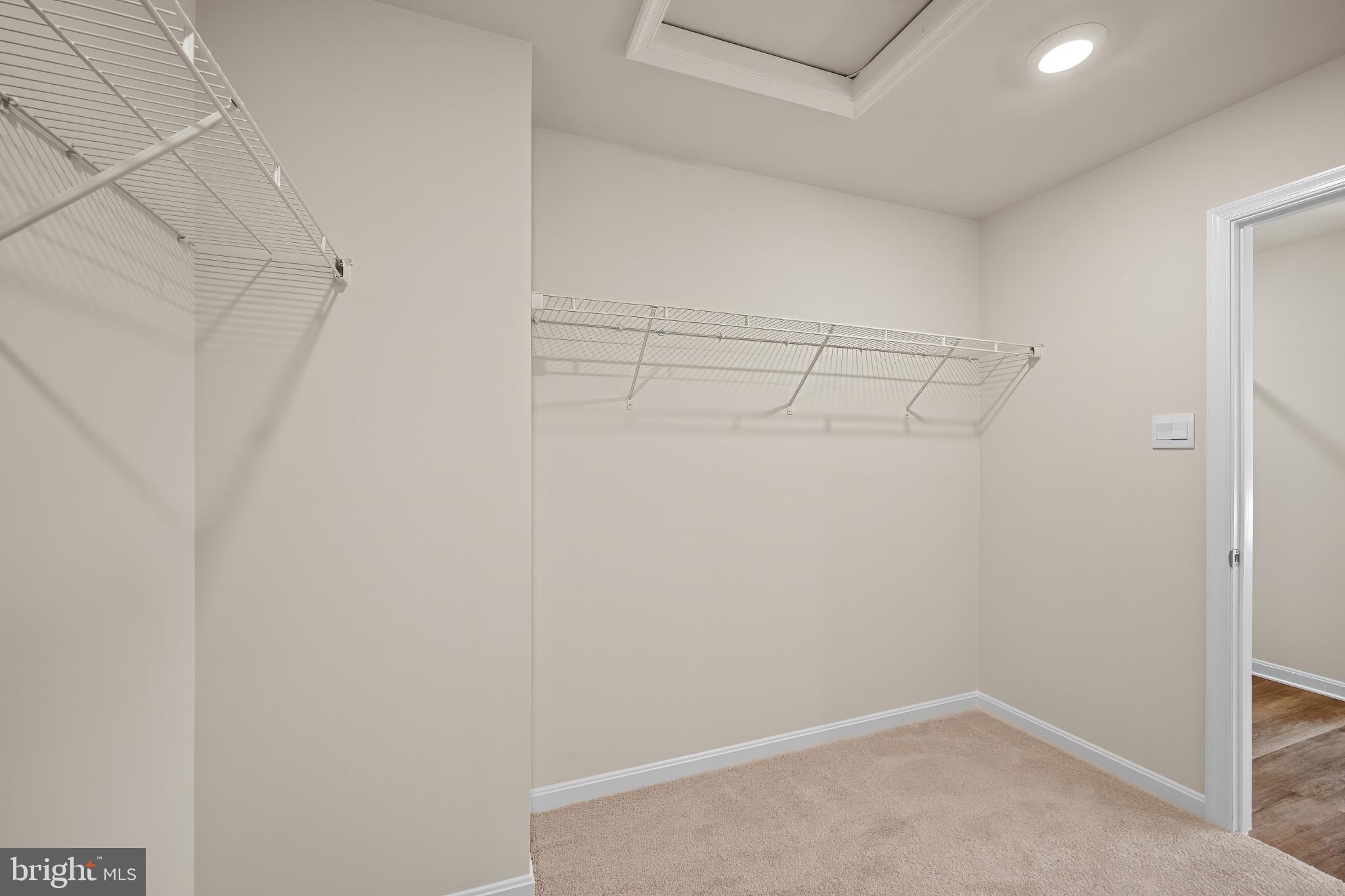 547 Atkinson Street Charles Town, WV 25414 - Photo 21 of 31 a view of a room with racks on the wall