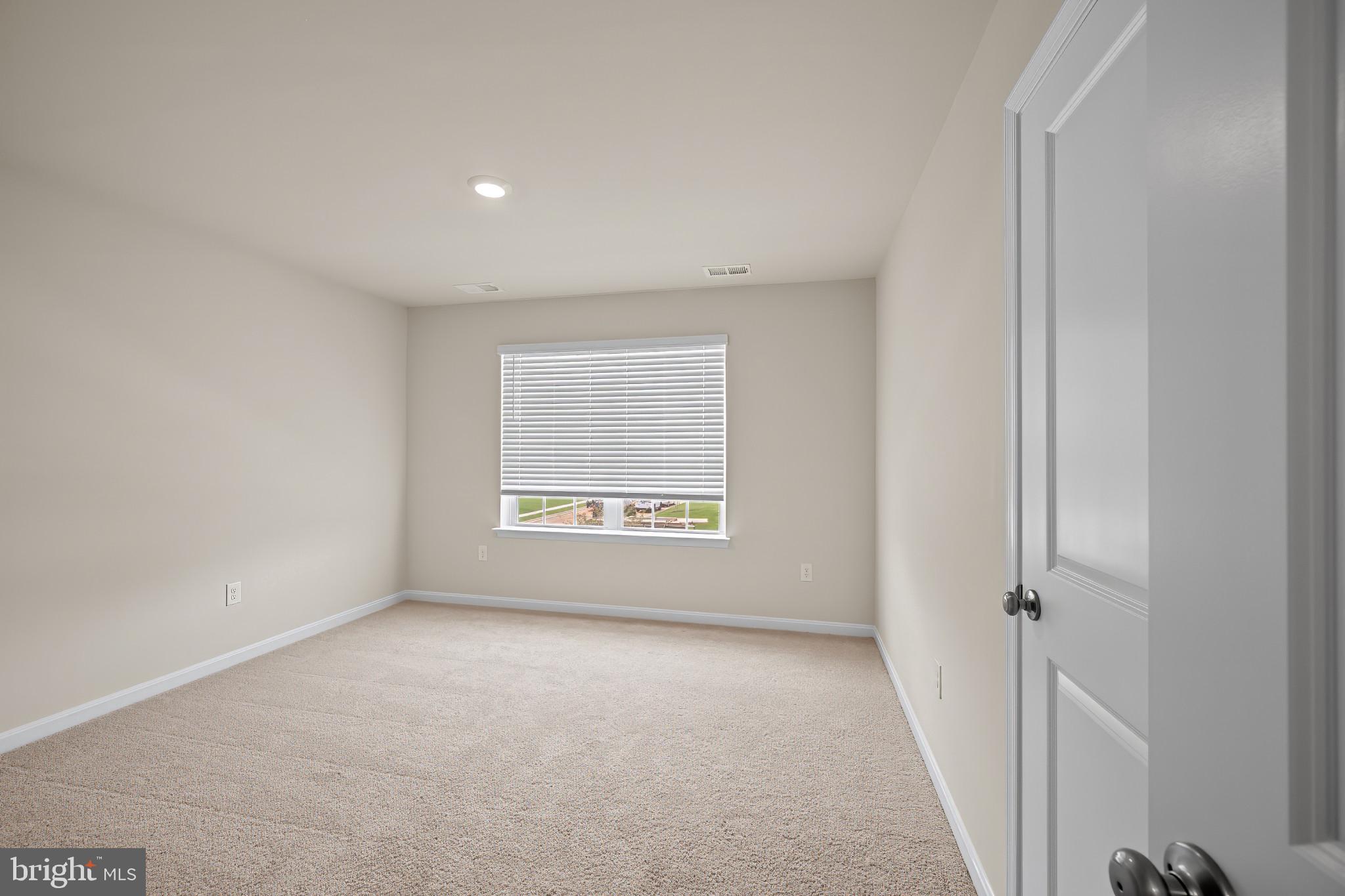 547 Atkinson Street Charles Town, WV 25414 - Photo 28 of 31 a view of an empty room with a window