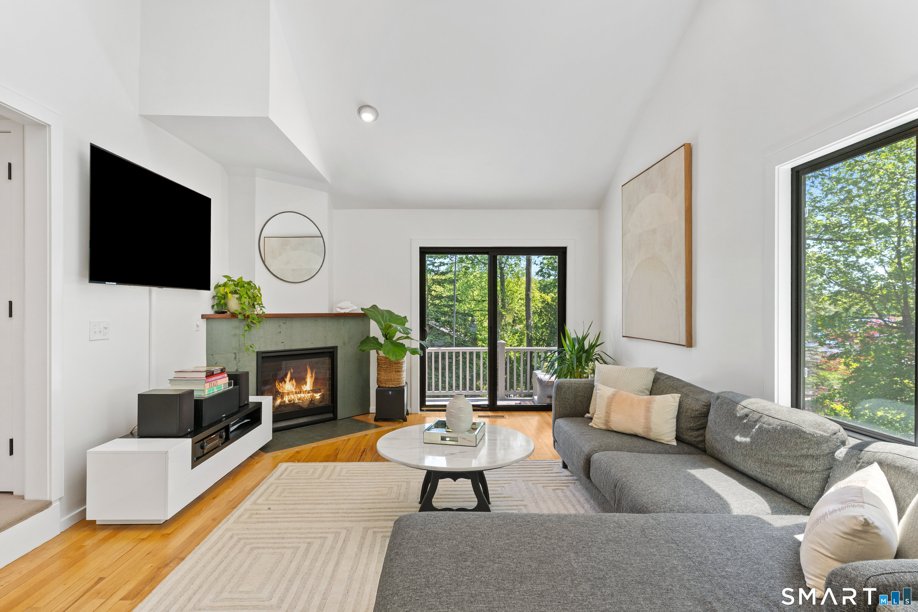 9 1st Lane Ridgefield, CT 06877 - Photo 11 of 40 Stunning family room with vaulted ceilings & cozy gas fireplace.