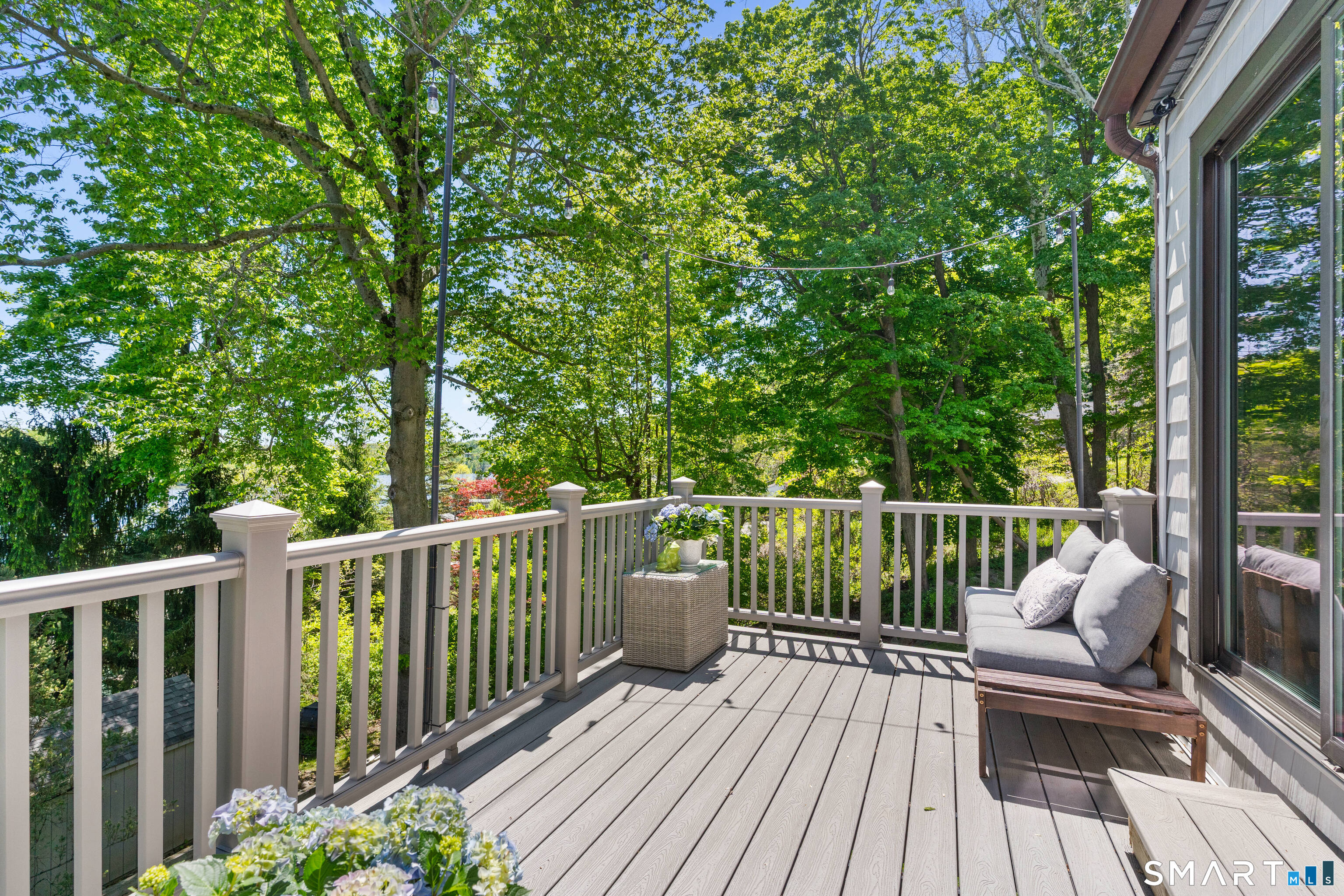 9 1st Lane Ridgefield, CT 06877 - Photo 15 of 40 Large Trex deck off room room provides incredible indoor/outdoor flow.