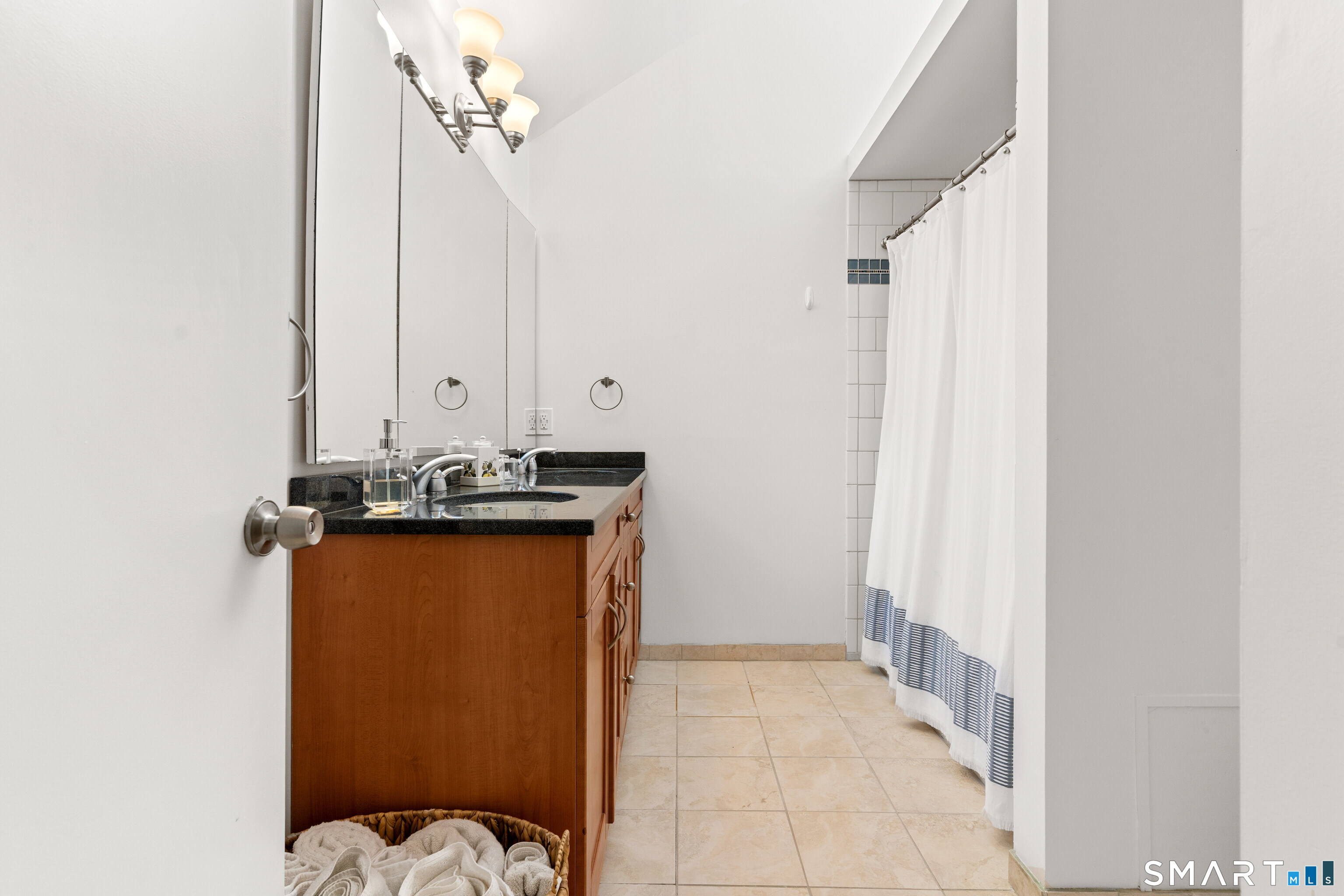 9 1st Lane Ridgefield, CT 06877 - Photo 32 of 40 Additional upper level full bathroom with vaulted ceilings.