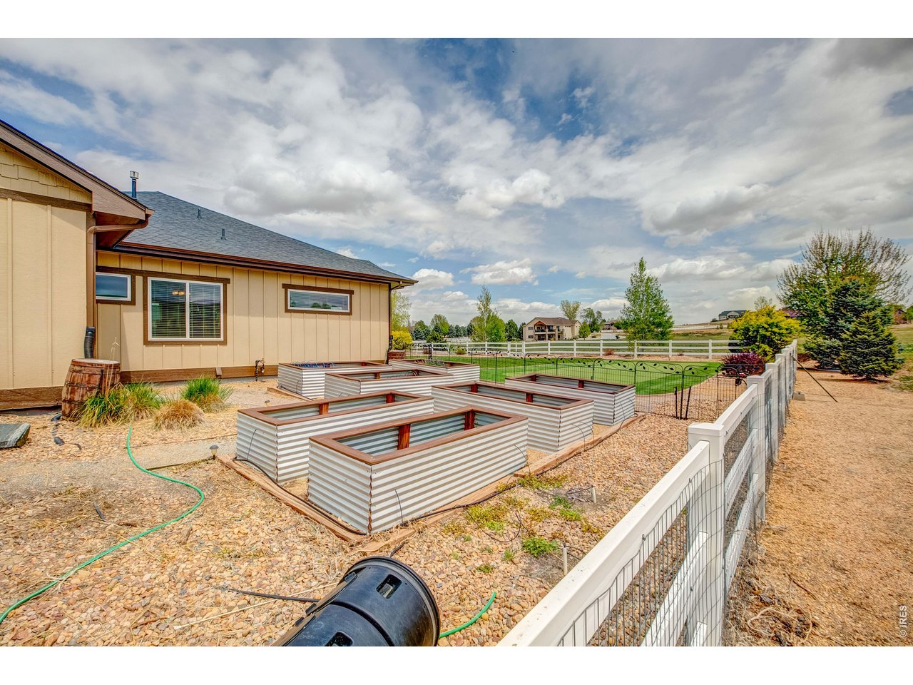 39764 Ridge Park Drive Severance, CO 80610 - Photo 11 of 49 Grow your own veggies in these raised planters.