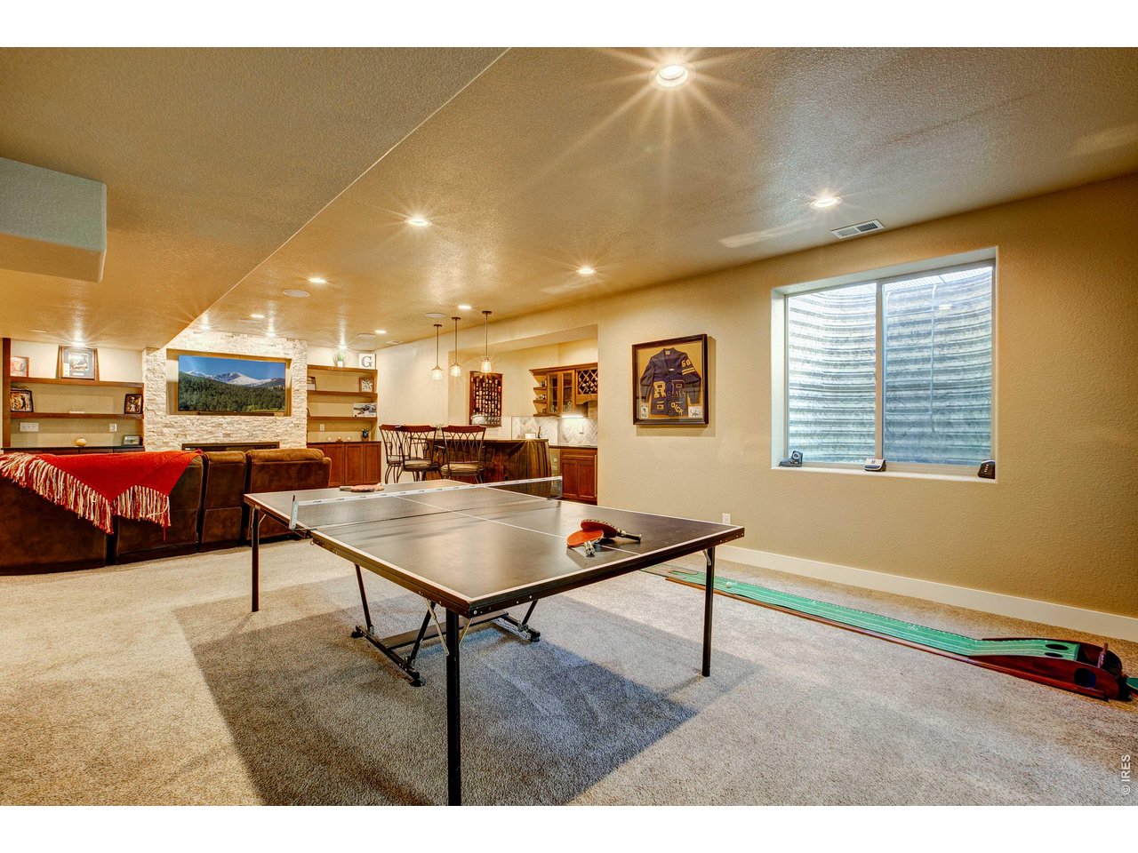 39764 Ridge Park Drive Severance, CO 80610 - Photo 36 of 49 The HUGE Rec/Family Room allows for endless opportunities!