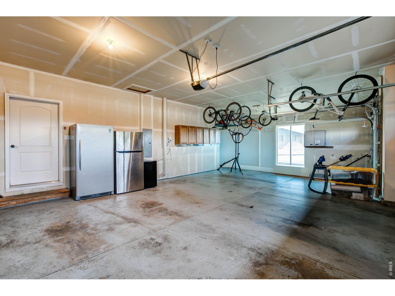 39764 Ridge Park Drive Severance, CO 80610 - Photo 46 of 49 Oversized attached 3 car garage. Freezer and refrigerator are included