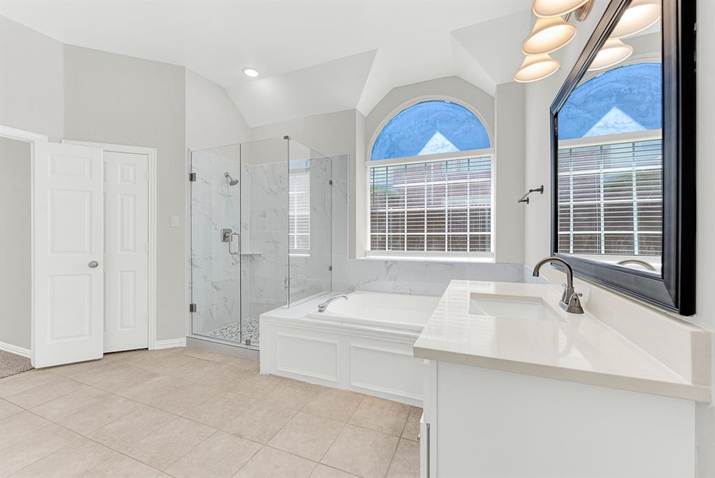 3500 Neiman Road Plano, TX 75025 - Photo 17 of 26 Everything in this bath has been upgraded in 2026! Frameless glass shower, vanities painted, upgraded counters and fresh paint - all waiting for you to move in and enjoy.
