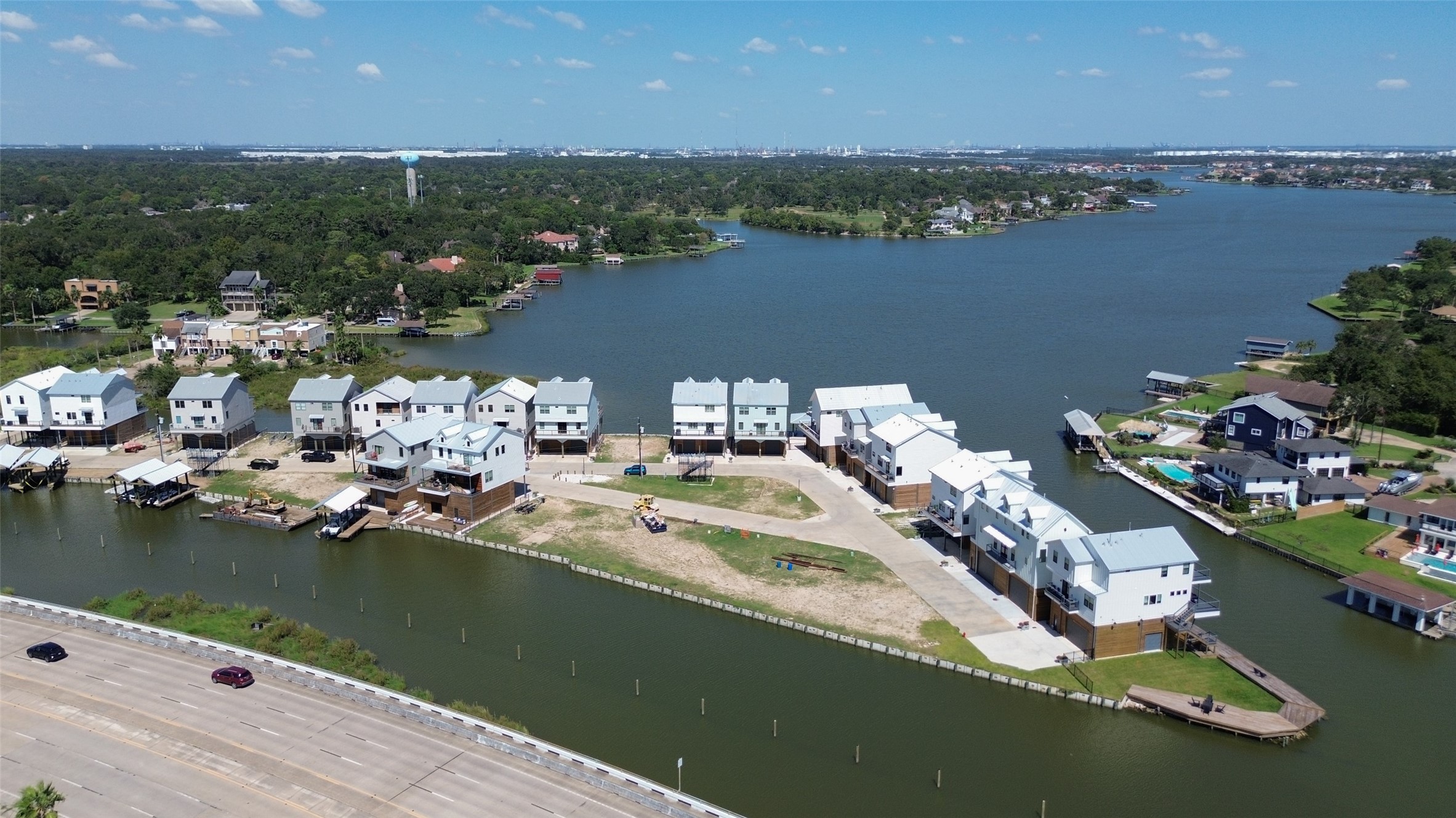 34 Commander Runco Lane Seabrook, TX 77586 - Photo 32 of 35 an aerial view of a house with a lake view