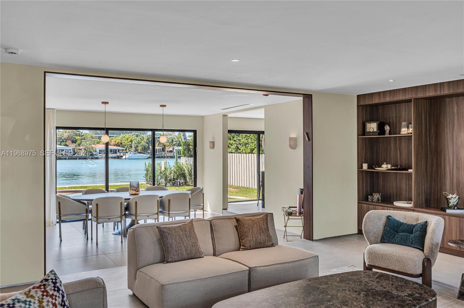 1170 South Biscayne Point Road Miami Beach, FL 33141 - Photo 11 of 48 a living room with furniture and a large window