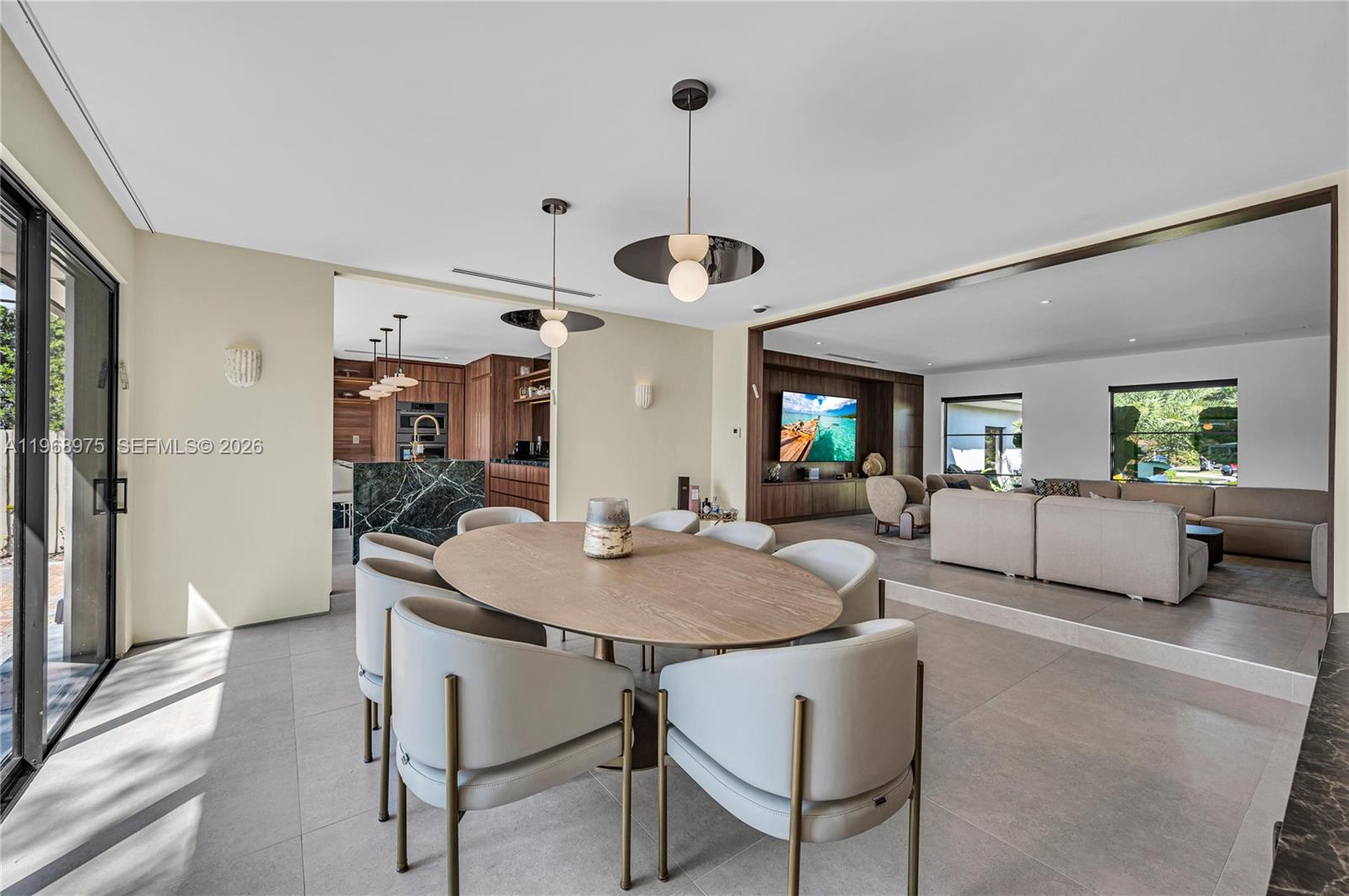 1170 South Biscayne Point Road Miami Beach, FL 33141 - Photo 16 of 48 a living room with furniture and a table
