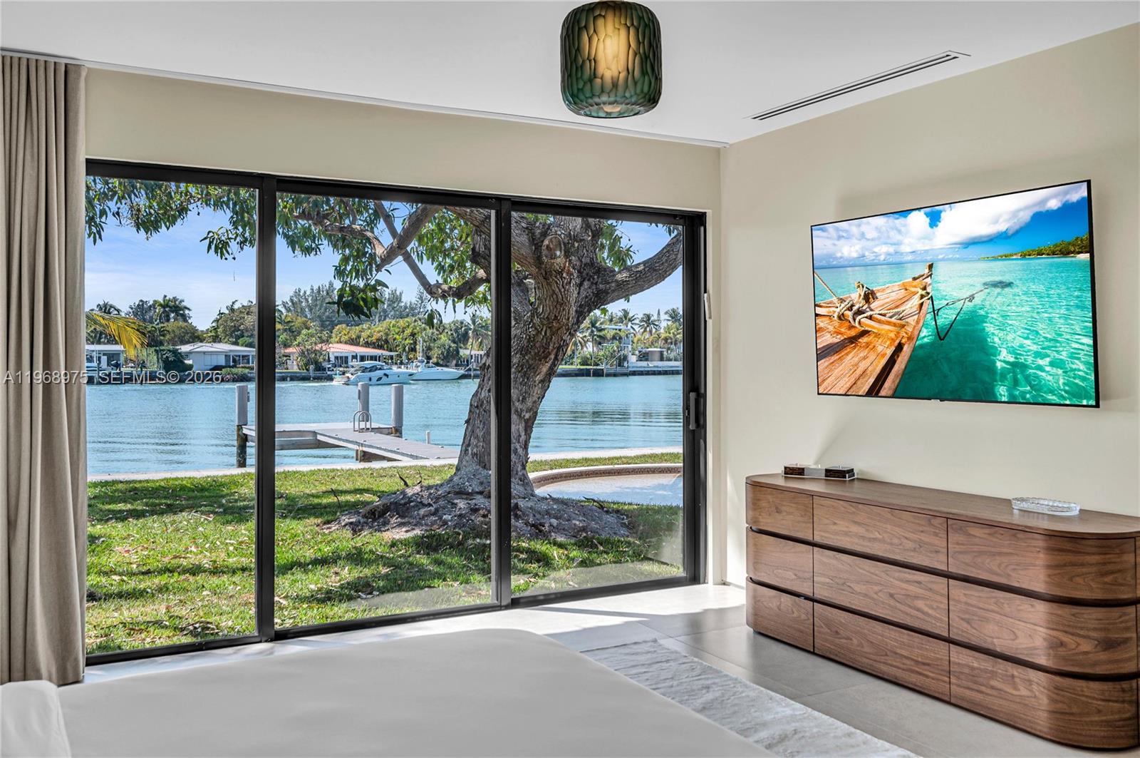 1170 South Biscayne Point Road Miami Beach, FL 33141 - Photo 22 of 48 a view of a living room and front door