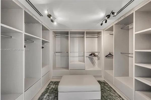 a bathroom with a shower and a tub