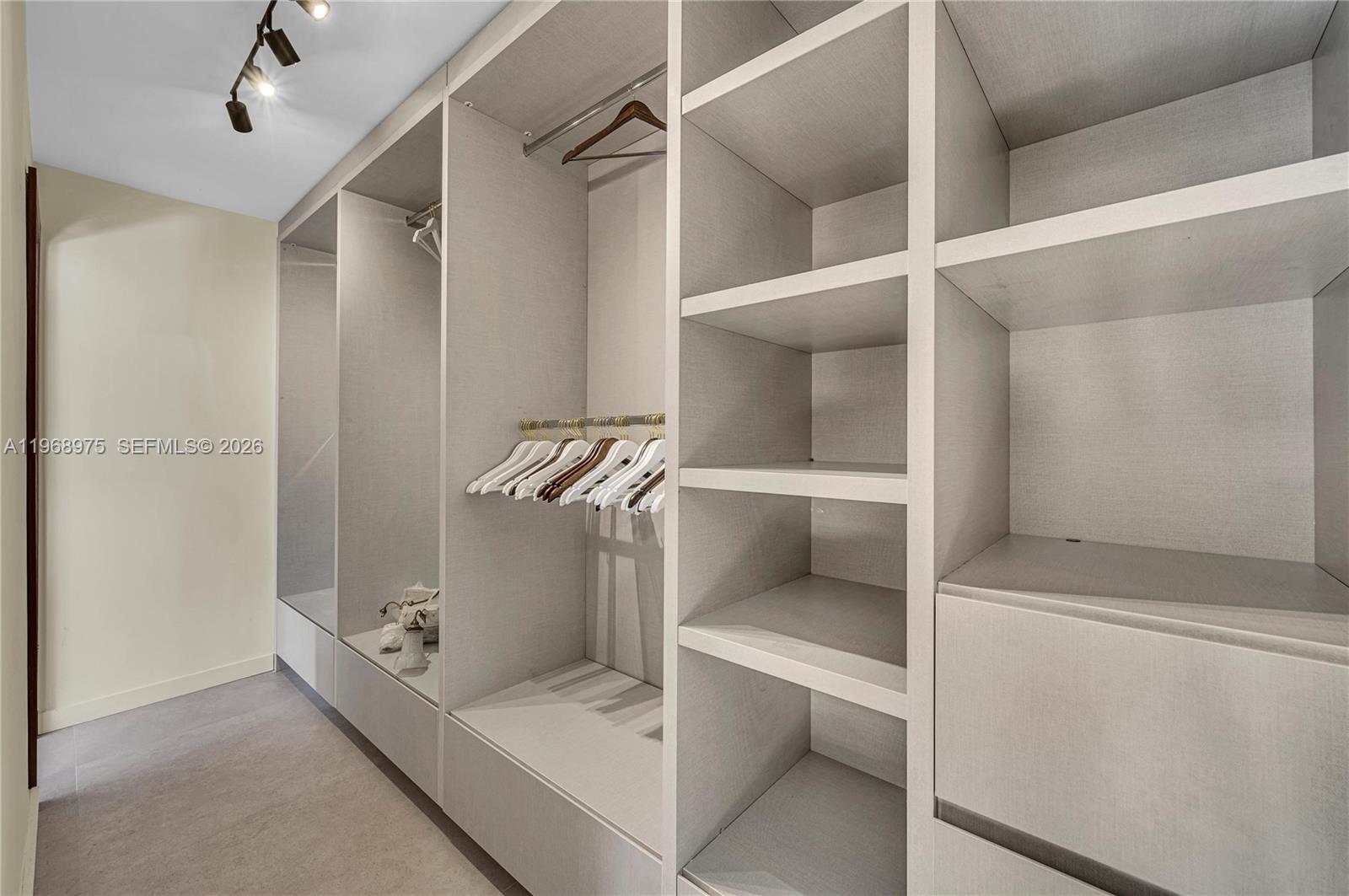 1170 South Biscayne Point Road Miami Beach, FL 33141 - Photo 33 of 48 a bathroom with a sink and glass door shower