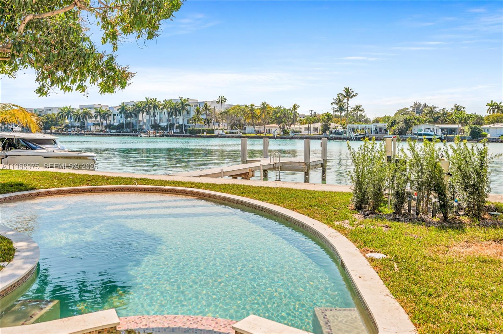 1170 South Biscayne Point Road Miami Beach, FL 33141 - Photo 40 of 48 a view of a swimming pool and outdoor space