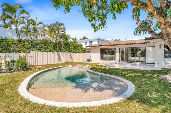 a view of swimming pool with a garden