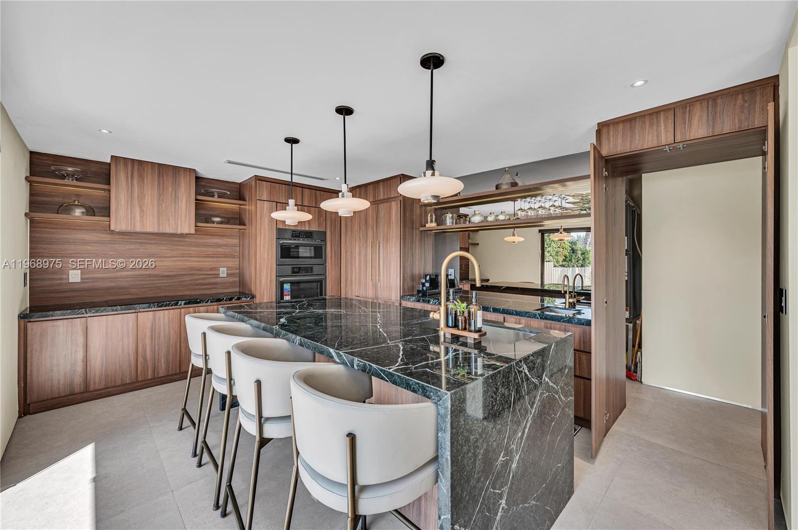 1170 South Biscayne Point Road Miami Beach, FL 33141 - Photo 6 of 48 a view of a dining room with furniture window and outside view