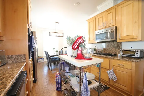 a room with furniture and wooden floor