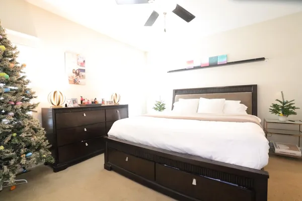 a bedroom with a bed and a cabinets