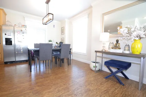 a view of a dining room with furniture
