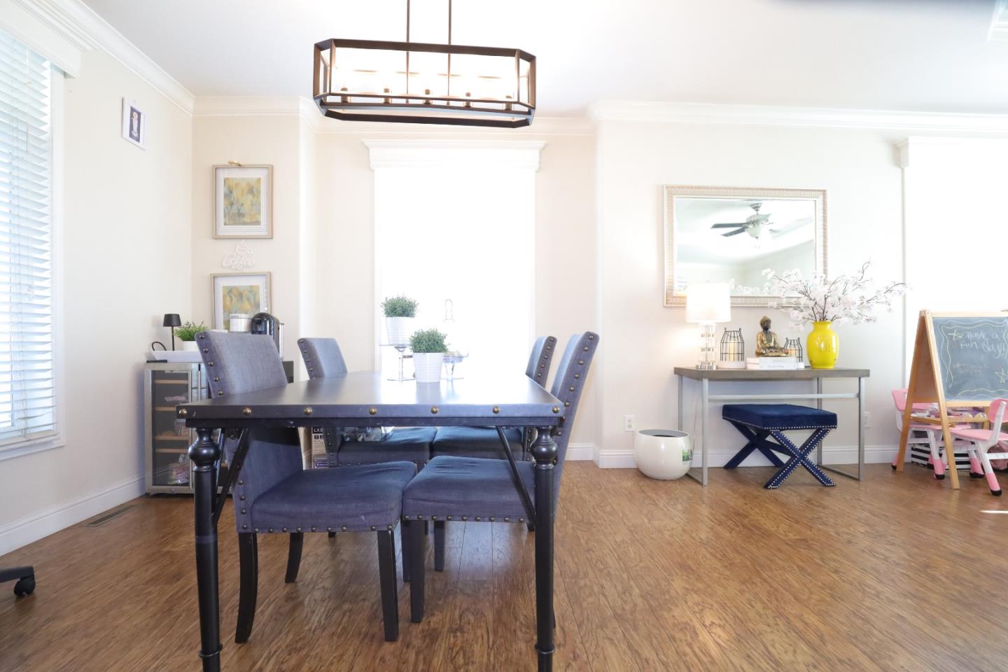 5450 Monterey Road, Unit 182 San Jose, CA 95111 - Photo 9 of 33 a view of a dining room with furniture and wooden floor
