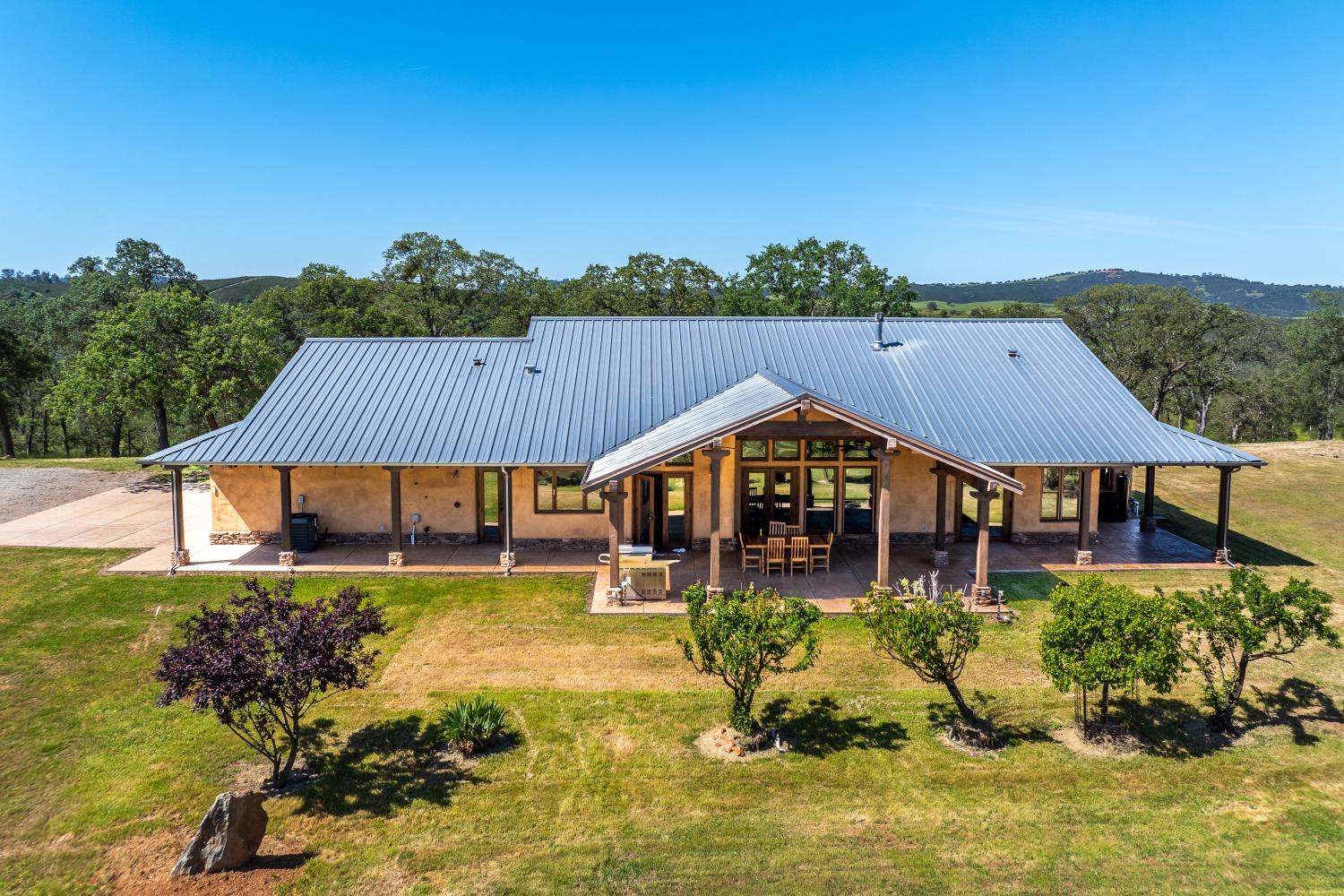 8591 Hogan Dam Road Valley Springs, CA 95252 - Photo 3 of 85 2-3 Bedroom, 3 bath main house with covered patio and fire-resistant materials
