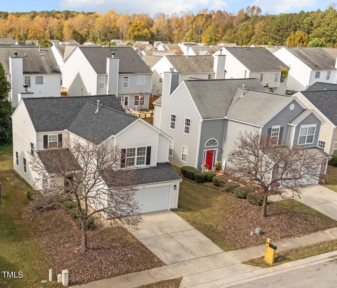 1612 Pebble Ridge Drive Raleigh, NC 27610 - Photo 2 of 31 7-web-or-mls-DJI_20241105120527_0663_D