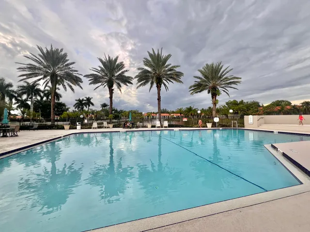 a view of a swimming pool and chair