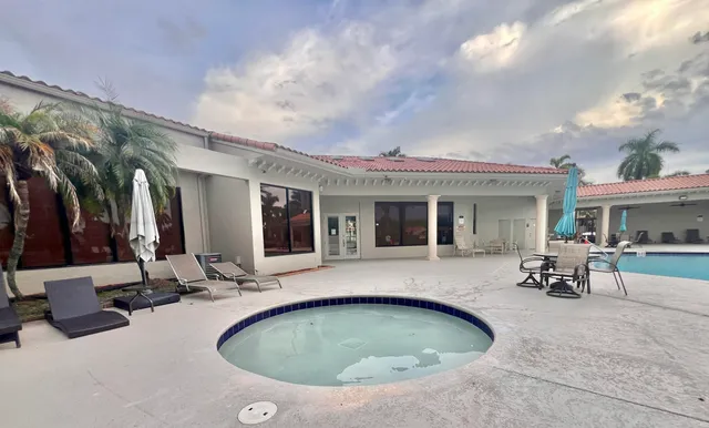 a view of a house with sitting area and furniture