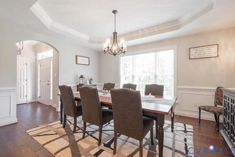 9425 Marie Road New Kent, VA 23124 - Photo 4 of 55 a view of a dining room with furniture window and wooden floor
