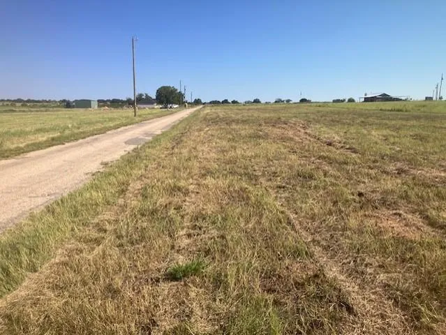 a view of a large body of water and mountain