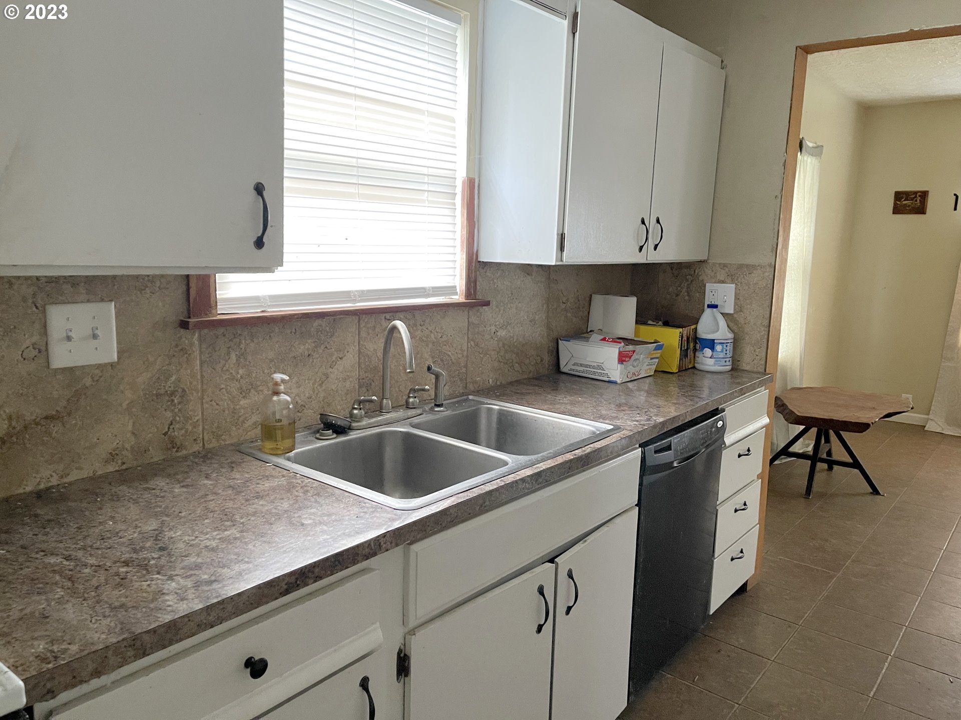 74479 Columbia River Highway Rainier, OR 97048 - Photo 13 of 21 a kitchen with a sink cabinets and window