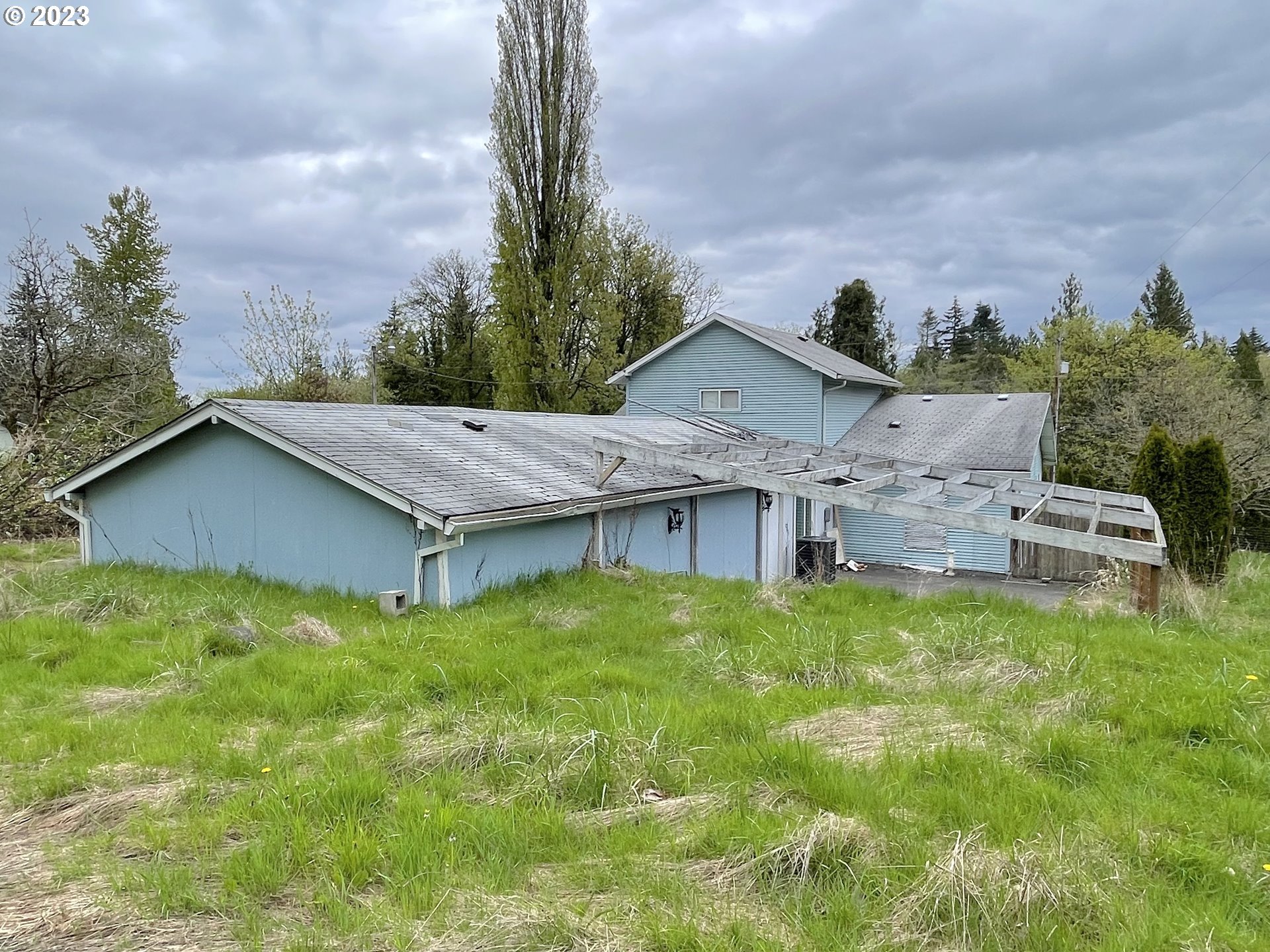 74479 Columbia River Highway Rainier, OR 97048 - Photo 3 of 21 a house view with a garden space