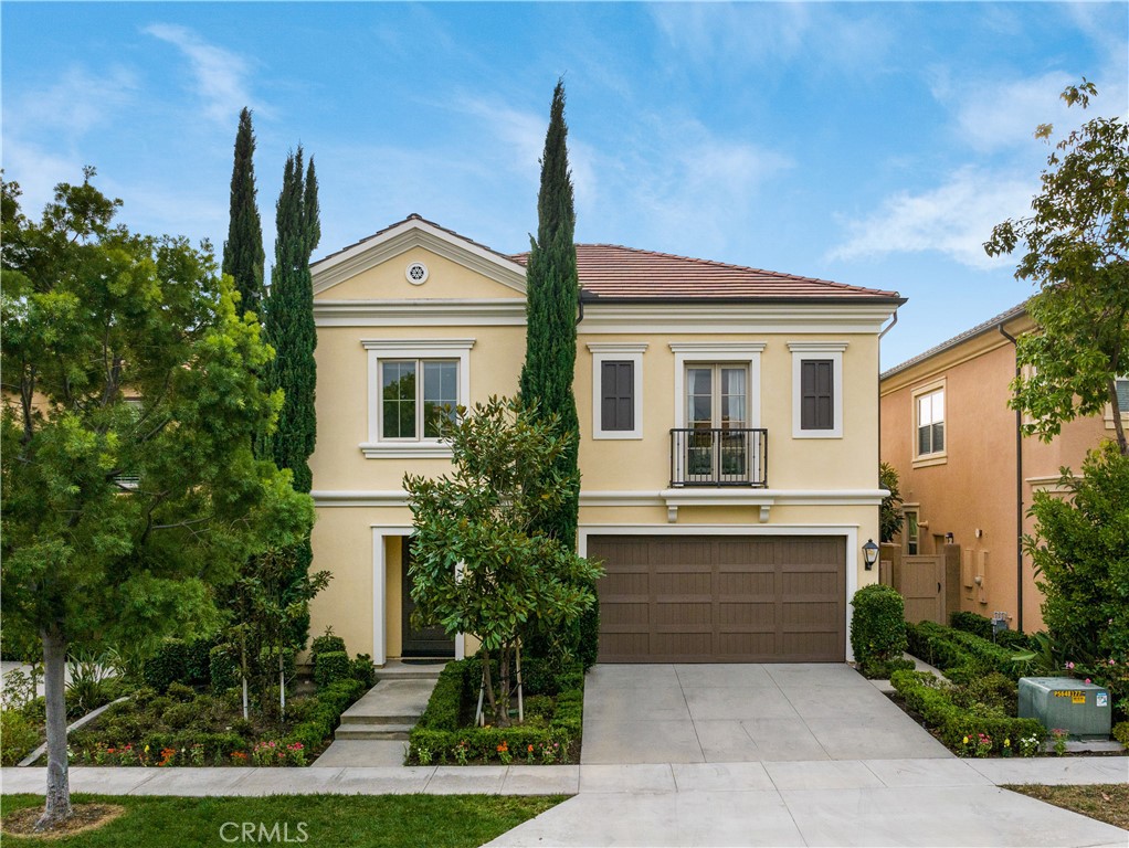 58 Elmdale Irvine, CA 92620 - Photo 1 of 16 a front view of a house with garden