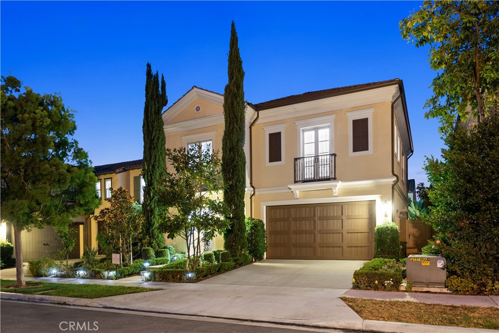 58 Elmdale Irvine, CA 92620 - Photo 7 of 16 a front view of a house with garden