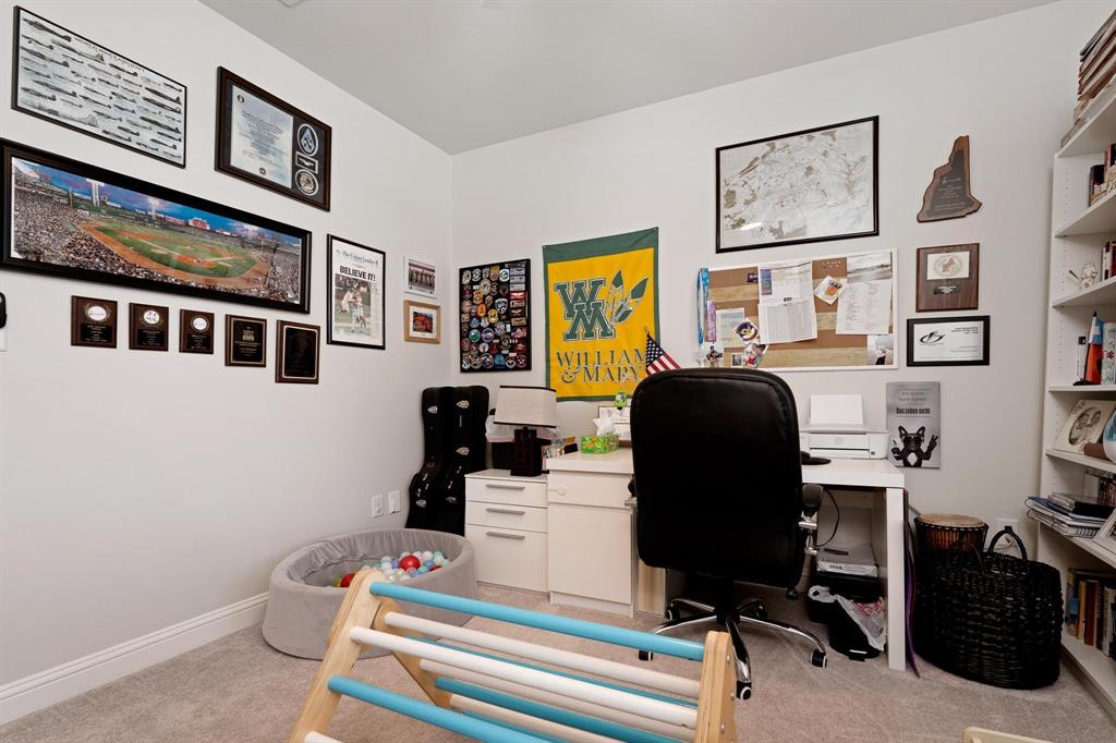 349 Garth Ridge Drive Abilene, TX 79602 - Photo 26 of 33 a work room with furniture and paintings on the wall