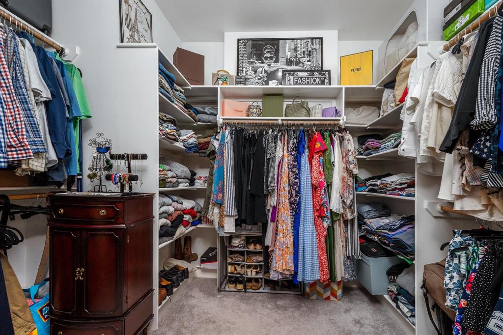 349 Garth Ridge Drive Abilene, TX 79602 - Photo 27 of 33 a view of walk in closet with clothes and shoes