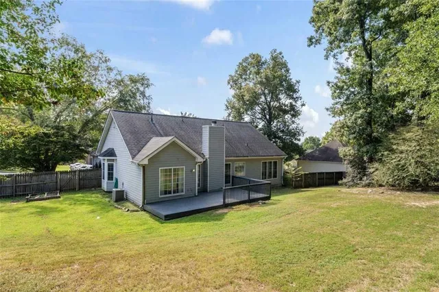a picture of a room with a close up of a white wall