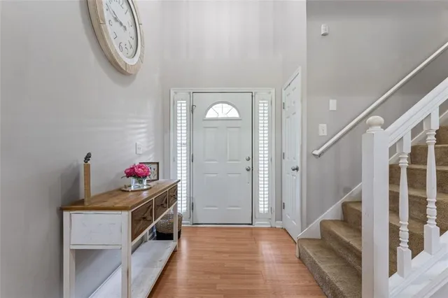 a view of a hallway with washer and dryer