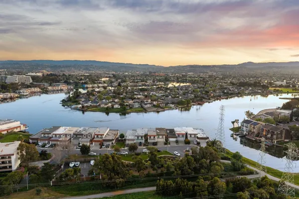 a view of a lake with multiple houses