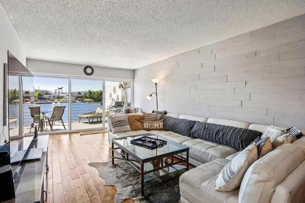 a living room with furniture and a table
