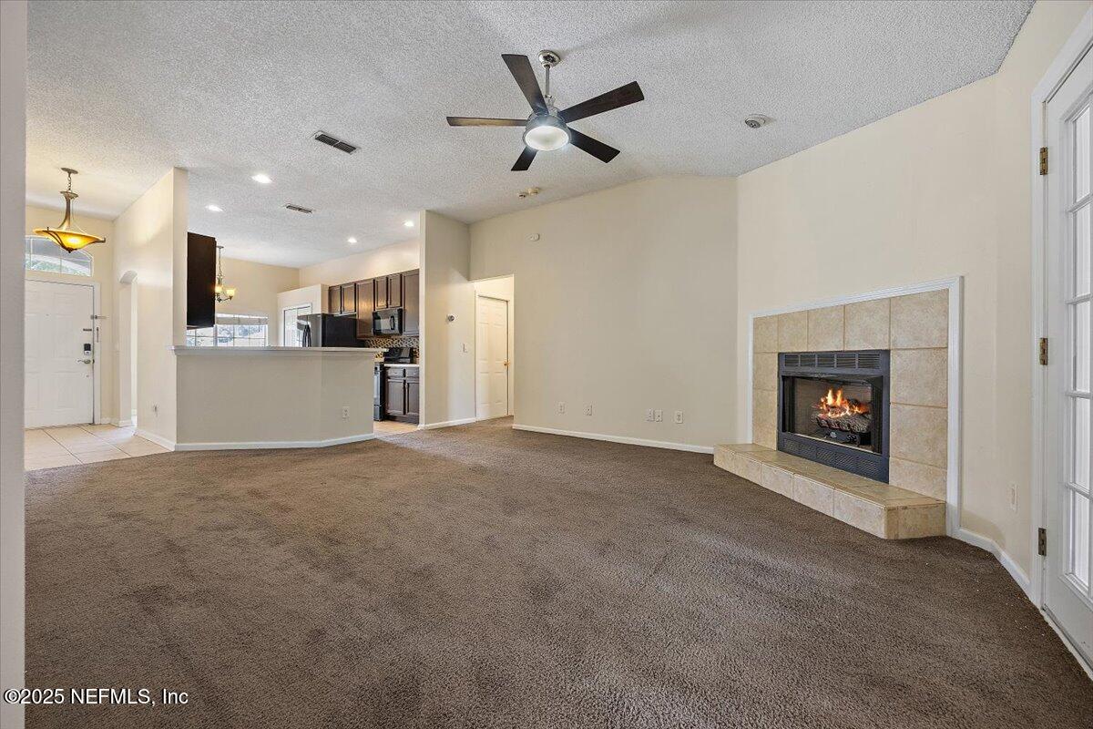 4365 Red Tip Road North Jacksonville, FL 32218 - Photo 8 of 23 08-Family Room to Kitchen