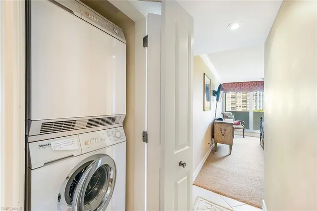 a view of living room with furniture and a fireplace