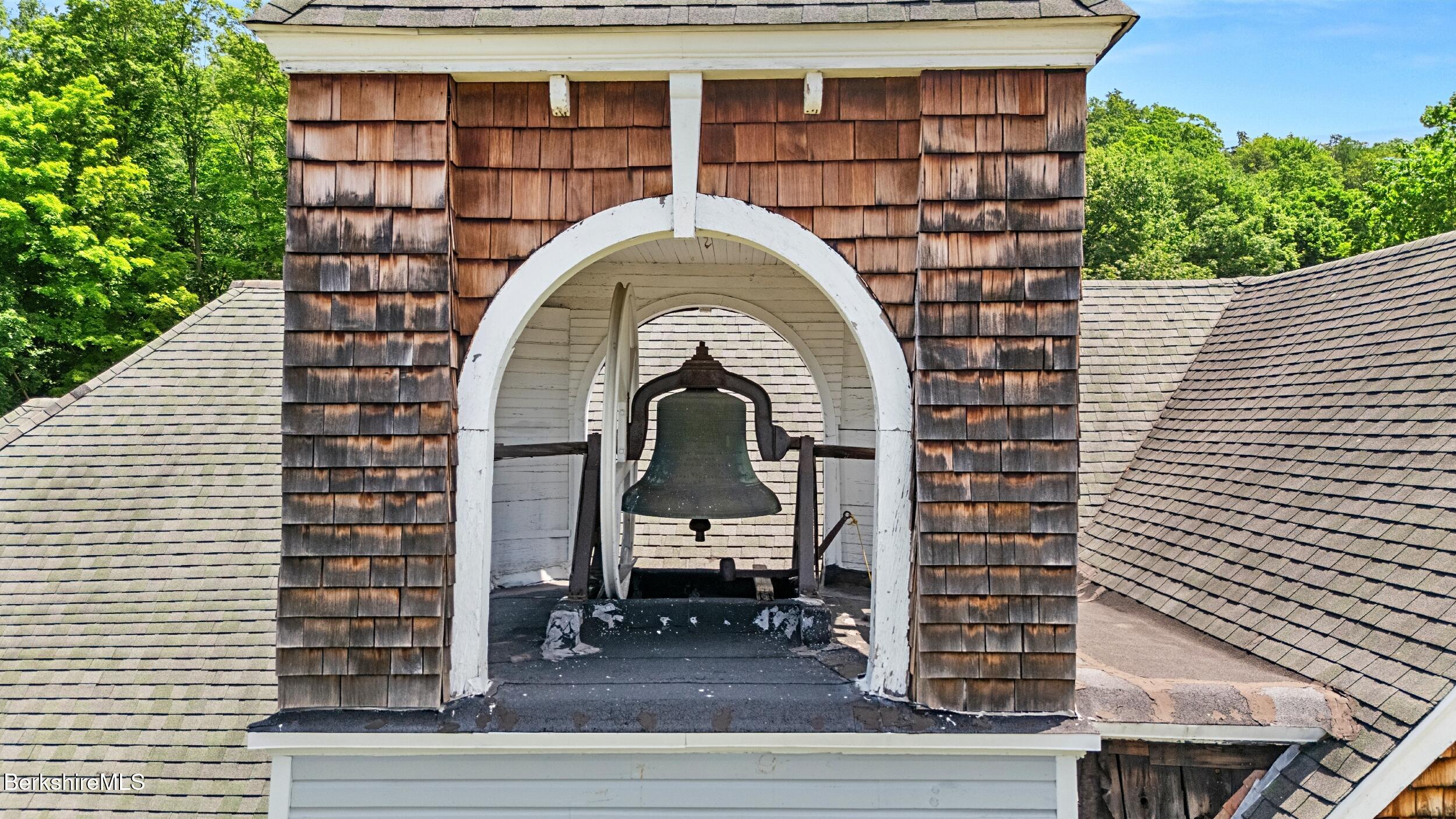 160 High Street Lee, MA 01238 - Photo 12 of 68 a front view of a house with a garden