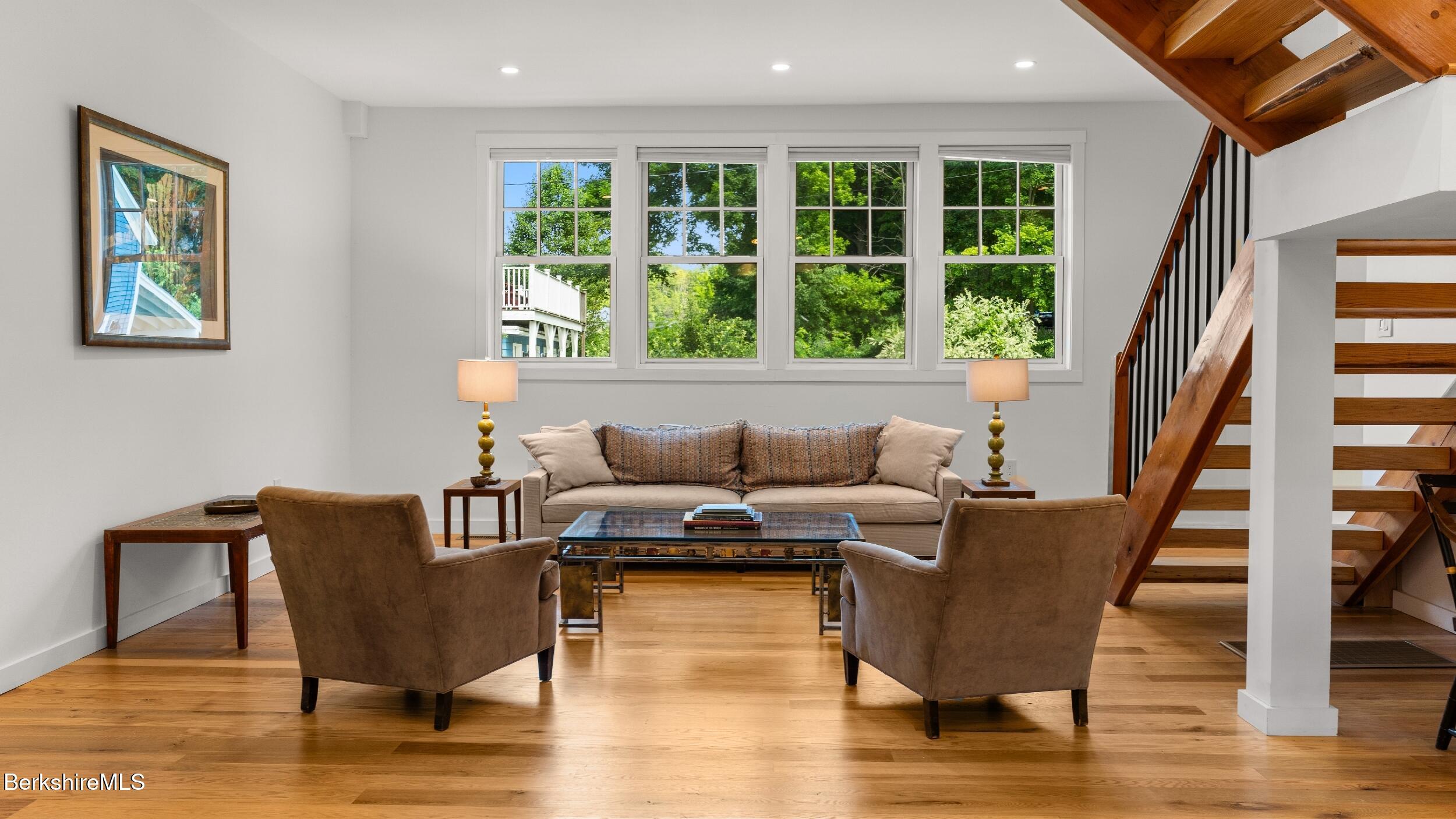 160 High Street Lee, MA 01238 - Photo 15 of 68 a living room with furniture and a large window