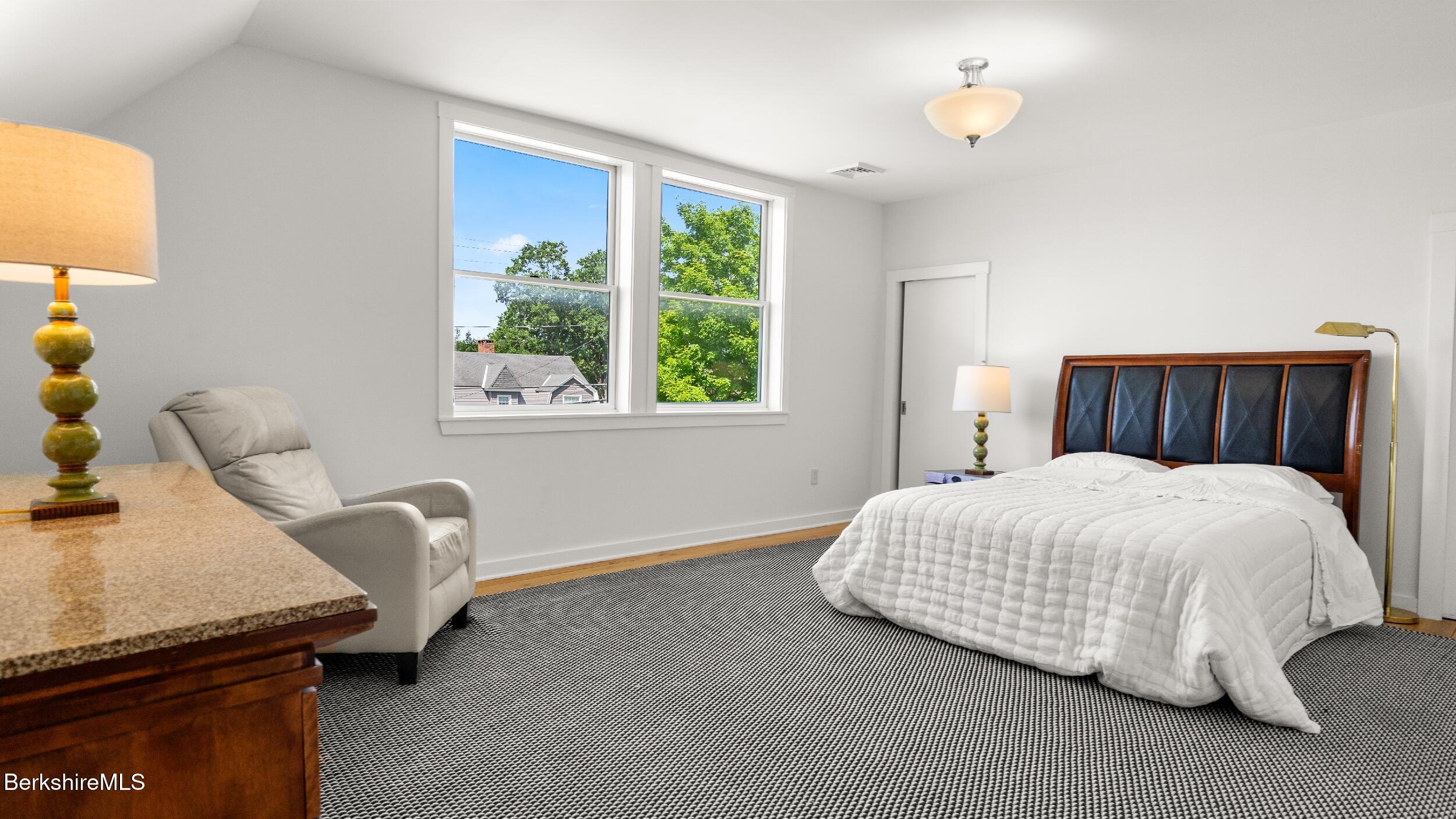 160 High Street Lee, MA 01238 - Photo 35 of 68 a bedroom with a bed and a window