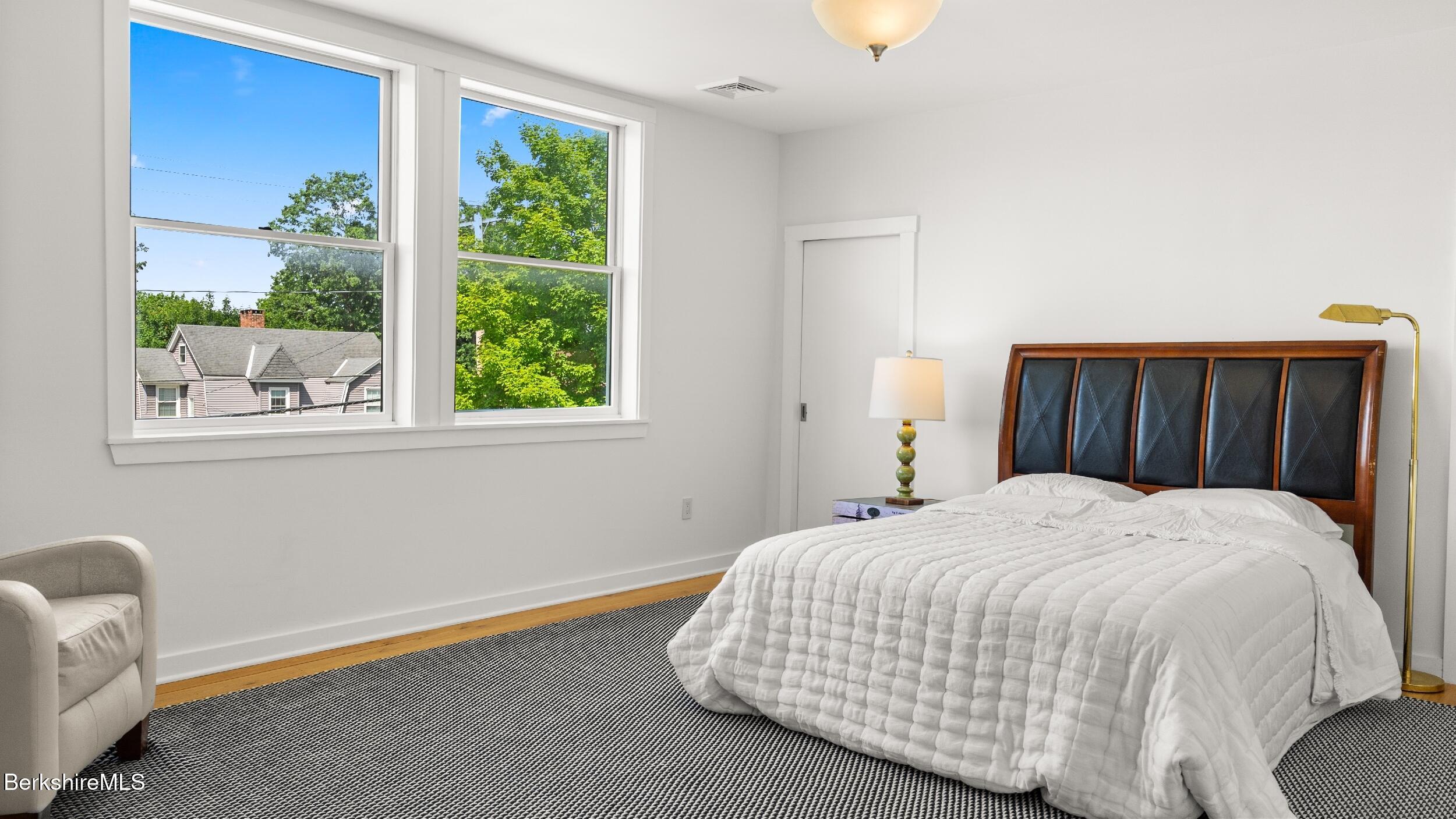 160 High Street Lee, MA 01238 - Photo 36 of 68 a bedroom with a bed and a window