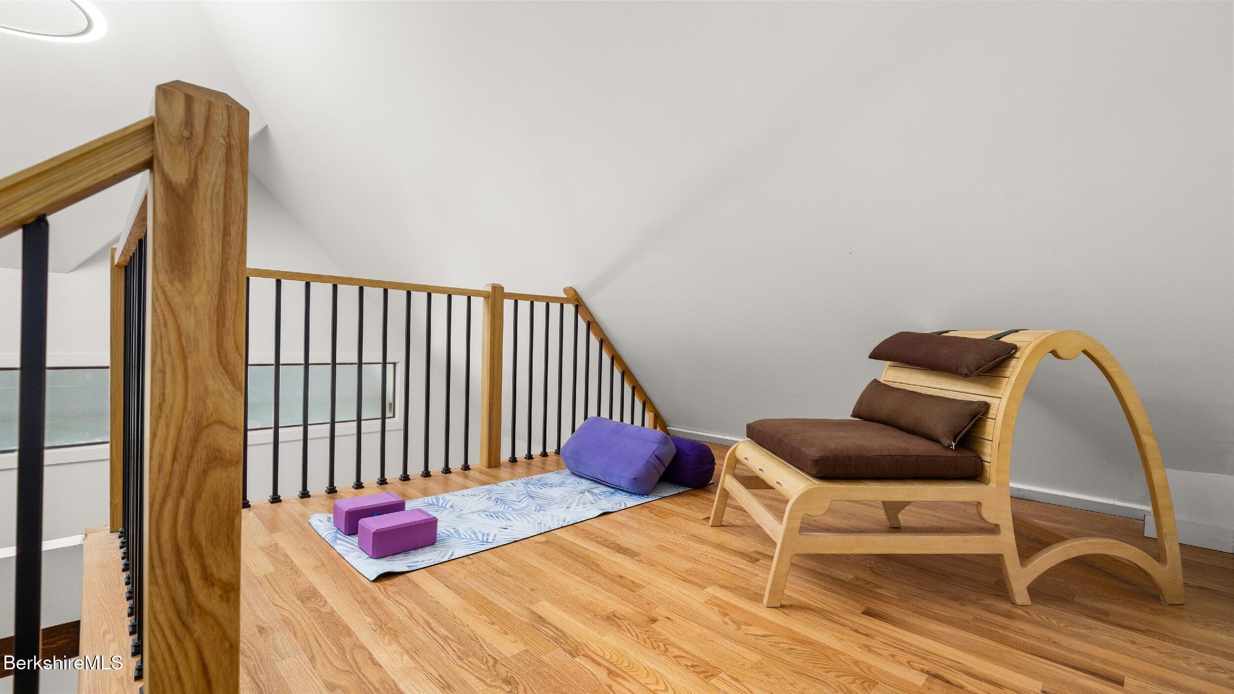 160 High Street Lee, MA 01238 - Photo 53 of 68 a bedroom with a bed and wooden floor